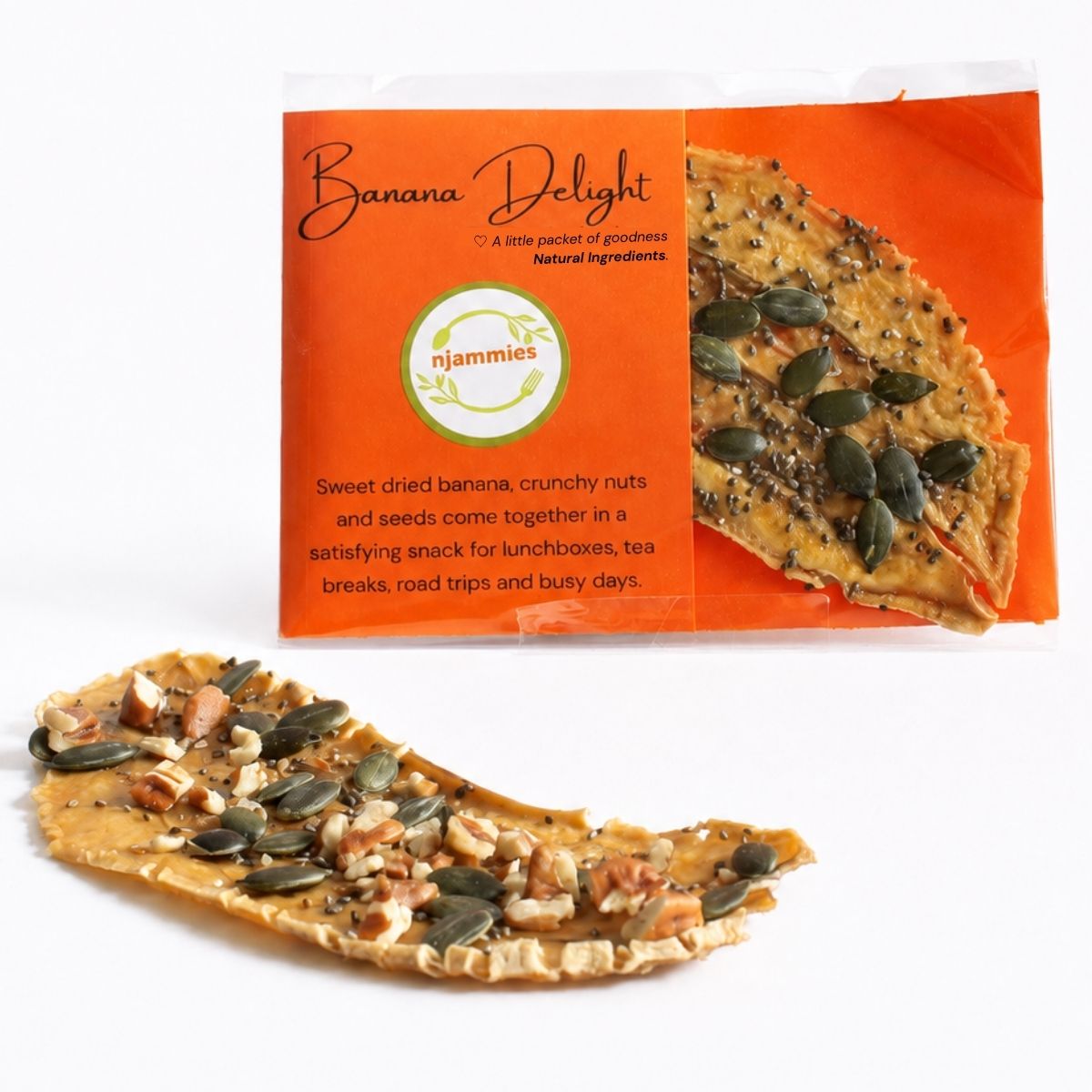 Njammies Banana Delight pack with dried banana topped with nuts and seeds displayed in front.