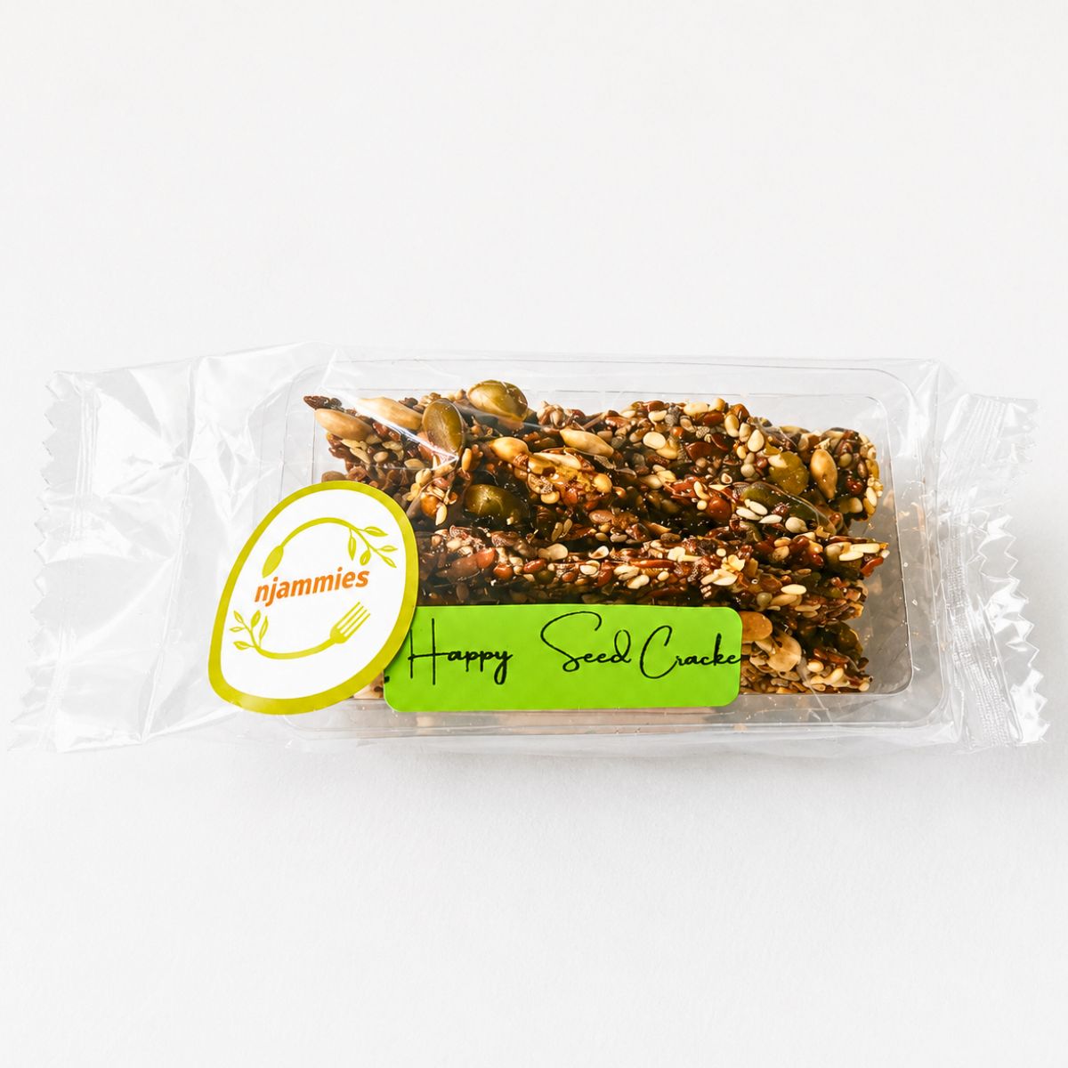 Happy Seed Crackers in a single portion transparent container